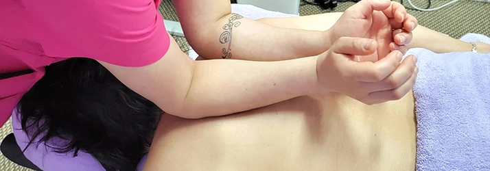 Aurora Angeles Massaging A Patient